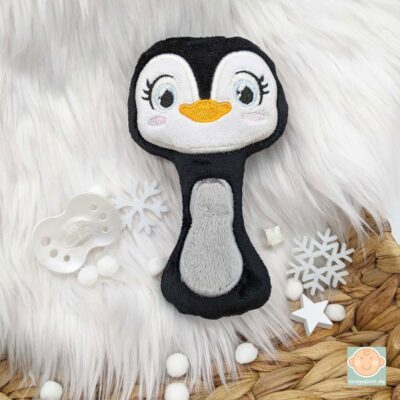 Babyrassel Pinguin aus Plüsch